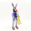 Burro con clarinete - talla de madera alebrije