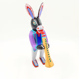 Burro con clarinete - talla de madera alebrije