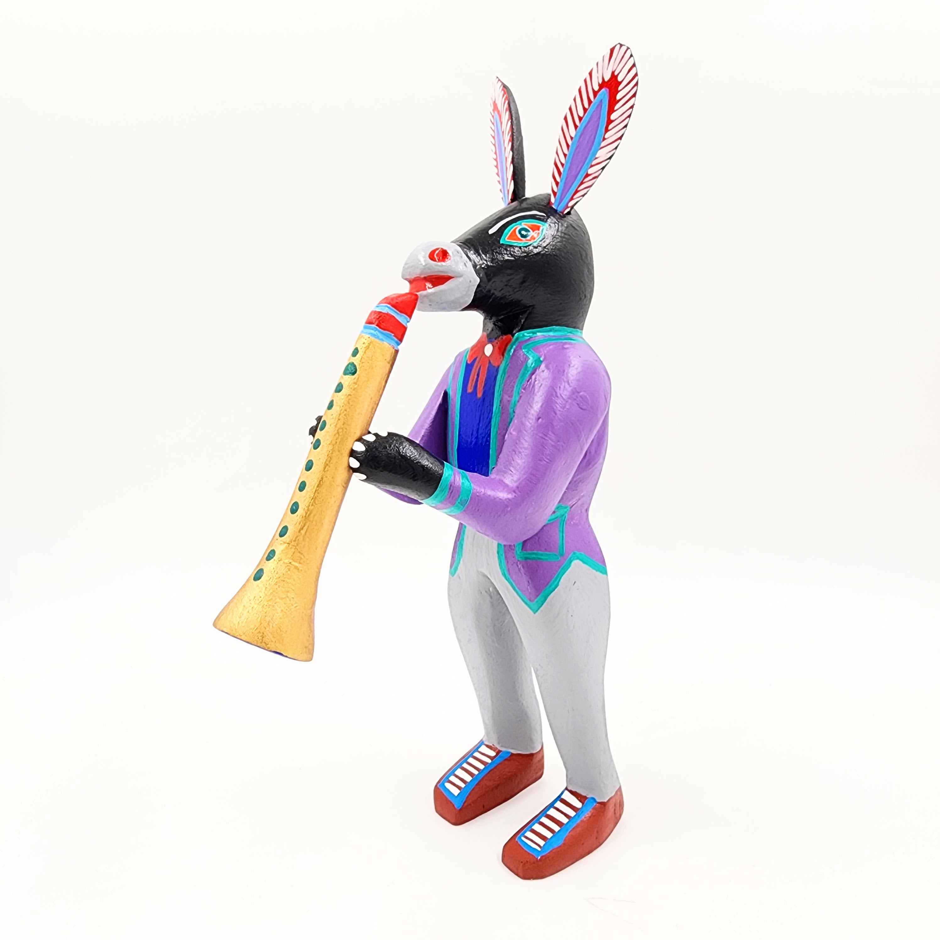 Burro con clarinete - talla de madera alebrije