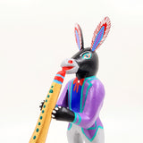 Burro con clarinete - talla de madera alebrije