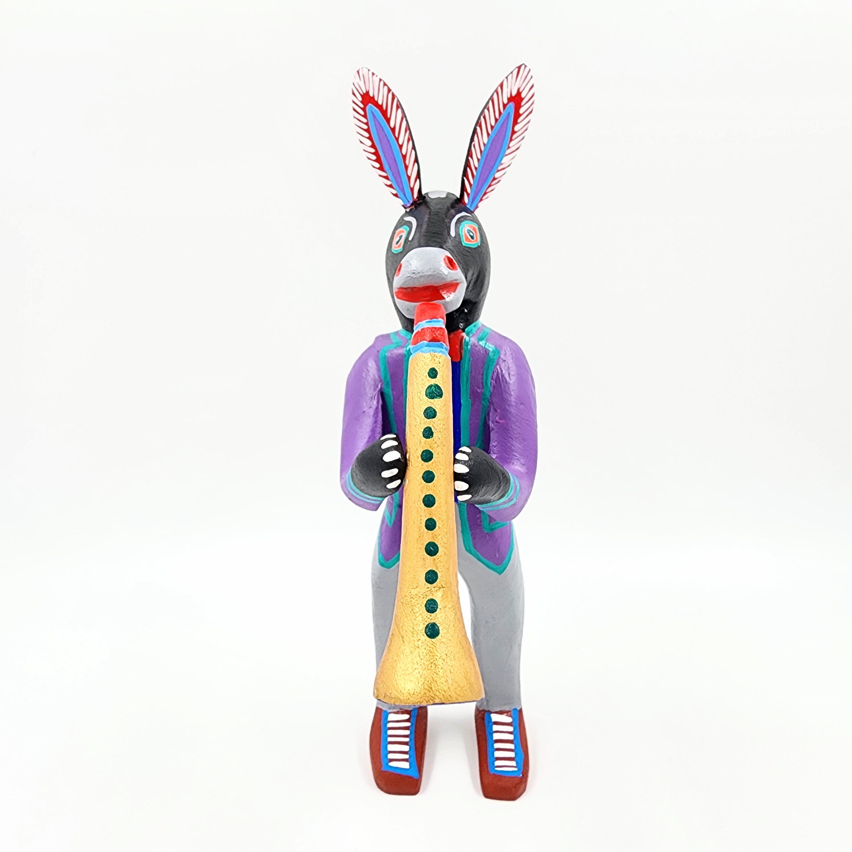 Burro con clarinete - talla de madera alebrije