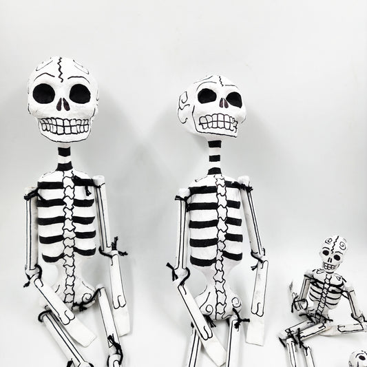 Jointed papier-mâché skeletons