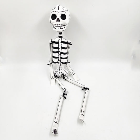 Jointed papier-mâché skeletons