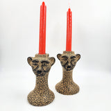 Candelabro jaguar en barro
