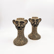 Candelabro jaguar en barro
