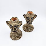 Candelabro jaguar en barro