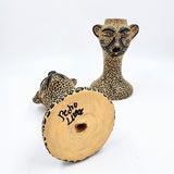 Candelabro jaguar en barro
