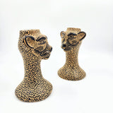 Candelabro jaguar en barro