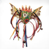 Corazón con flores y alas de madera