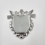 Corazón espejo con palomas de hojalata repujada