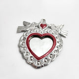 Corazón espejo con palomas de hojalata repujada