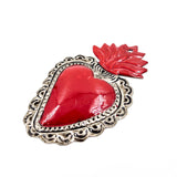 Corazones de hojalata repujada