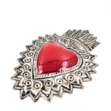 Corazones de hojalata repujada