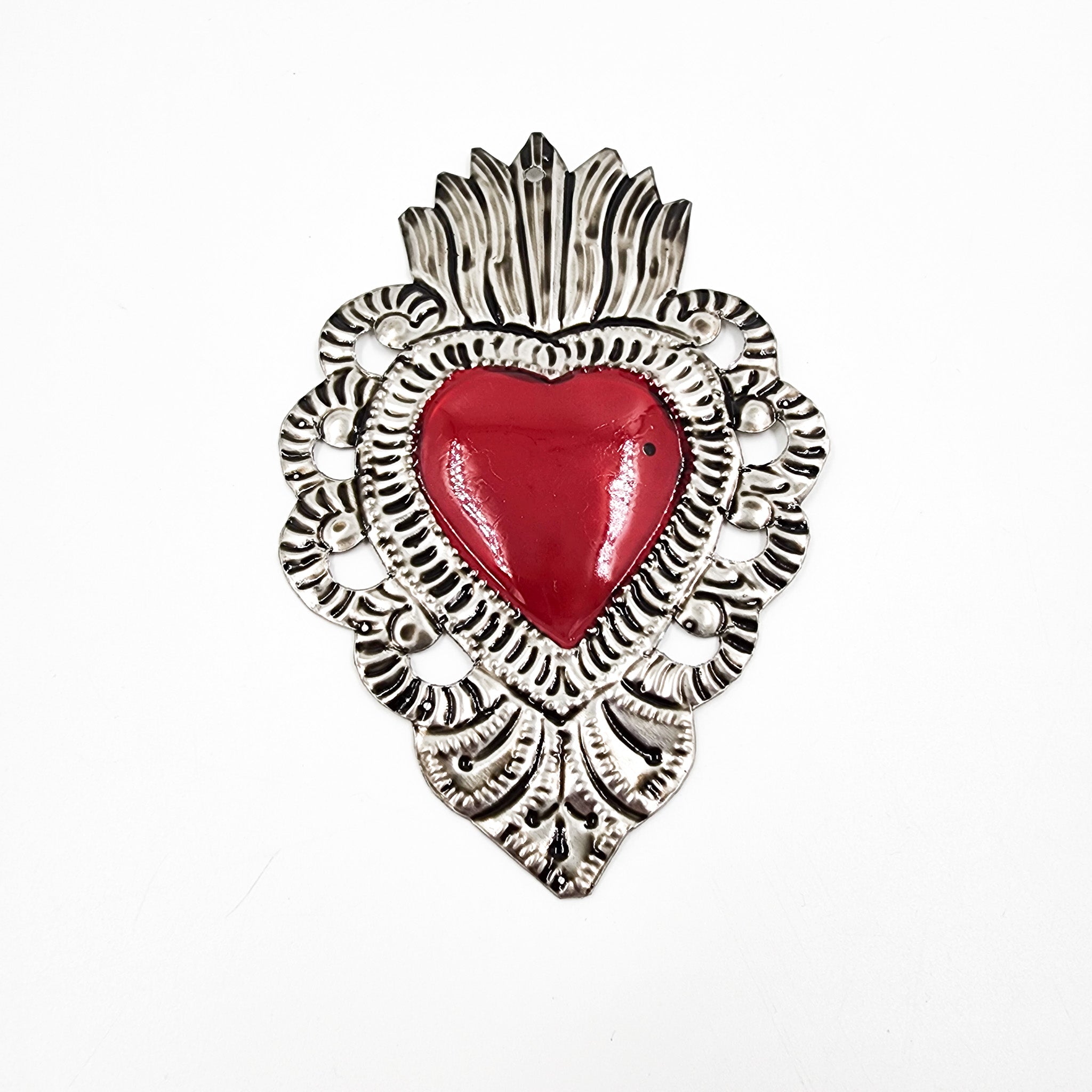 Embossed tin hearts