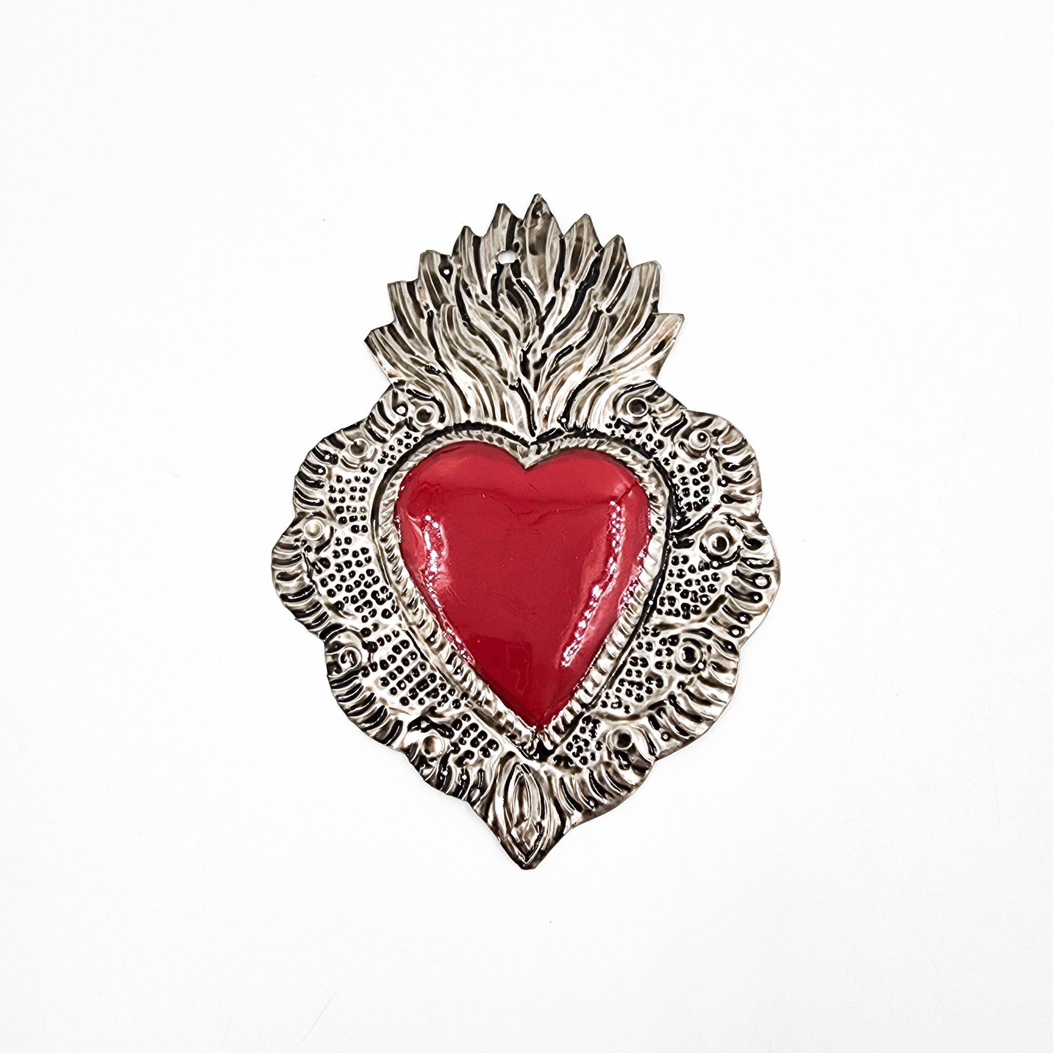 Embossed tin hearts