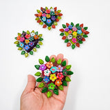 Corazón chico con flores de Barro Betus artesanal