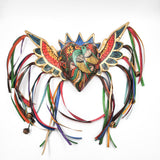 Corazón con pájaro y alas de madera