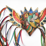 Corazón con pájaro y alas de madera