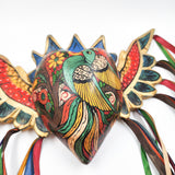 Corazón con pájaro y alas de madera