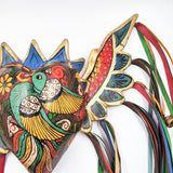 Corazón con pájaro y alas de madera