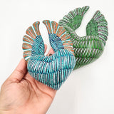 Corazones con alas artesanales de barro