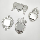 Corazón espejo de hojalata repujada