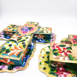 Cruz de hojalata pintada a mano con flores