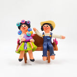 Banquita con la pareja - barro policromado