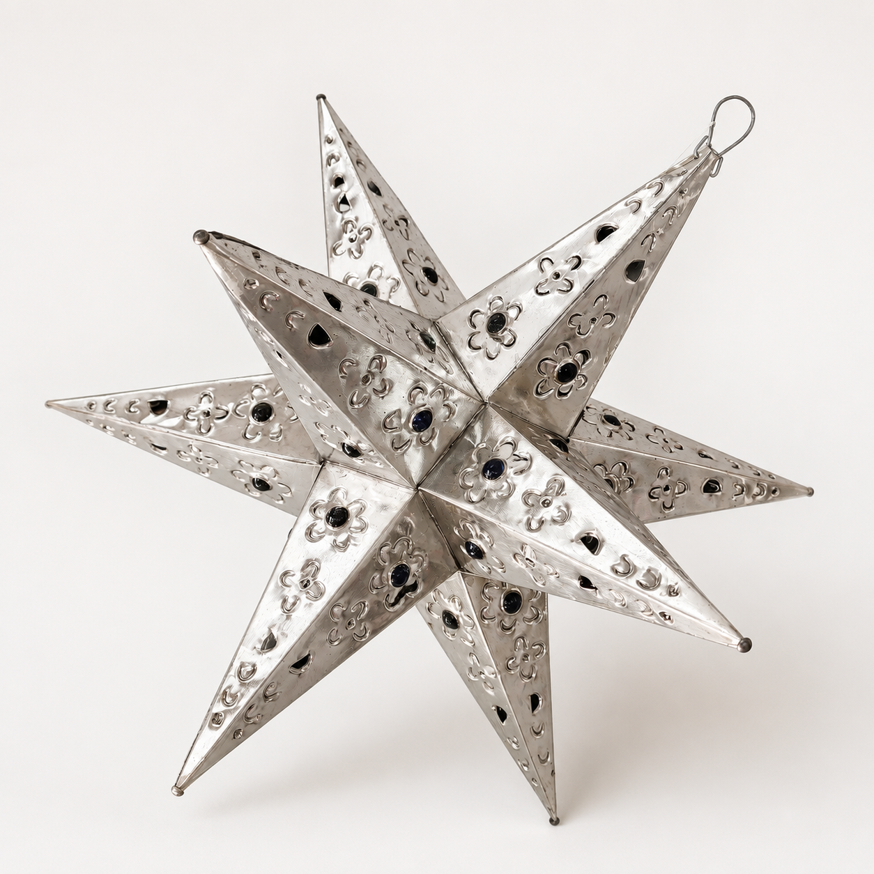 Estrellas de hojalata con canicas