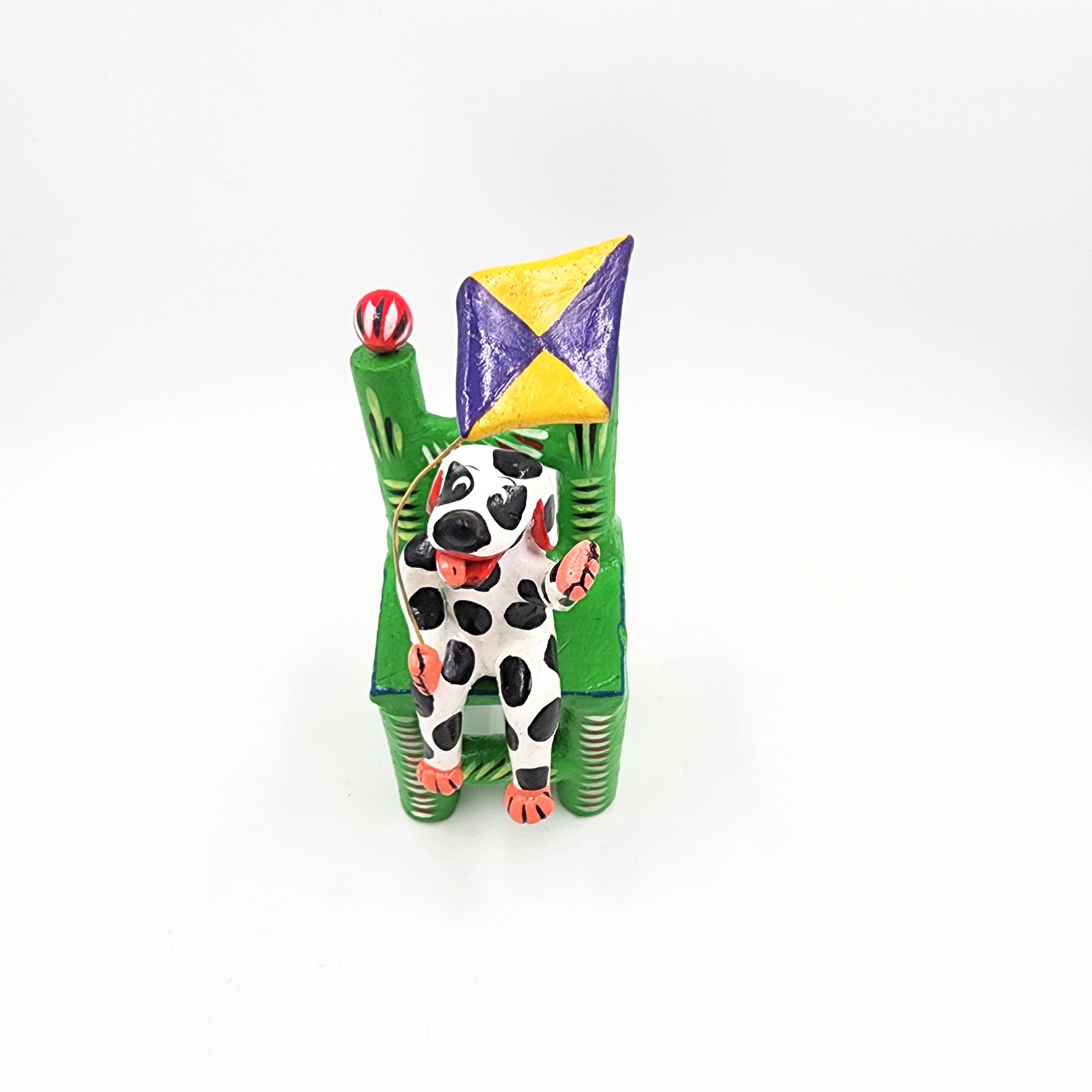 Perrito con papalote de barro Barro Betus artesanal