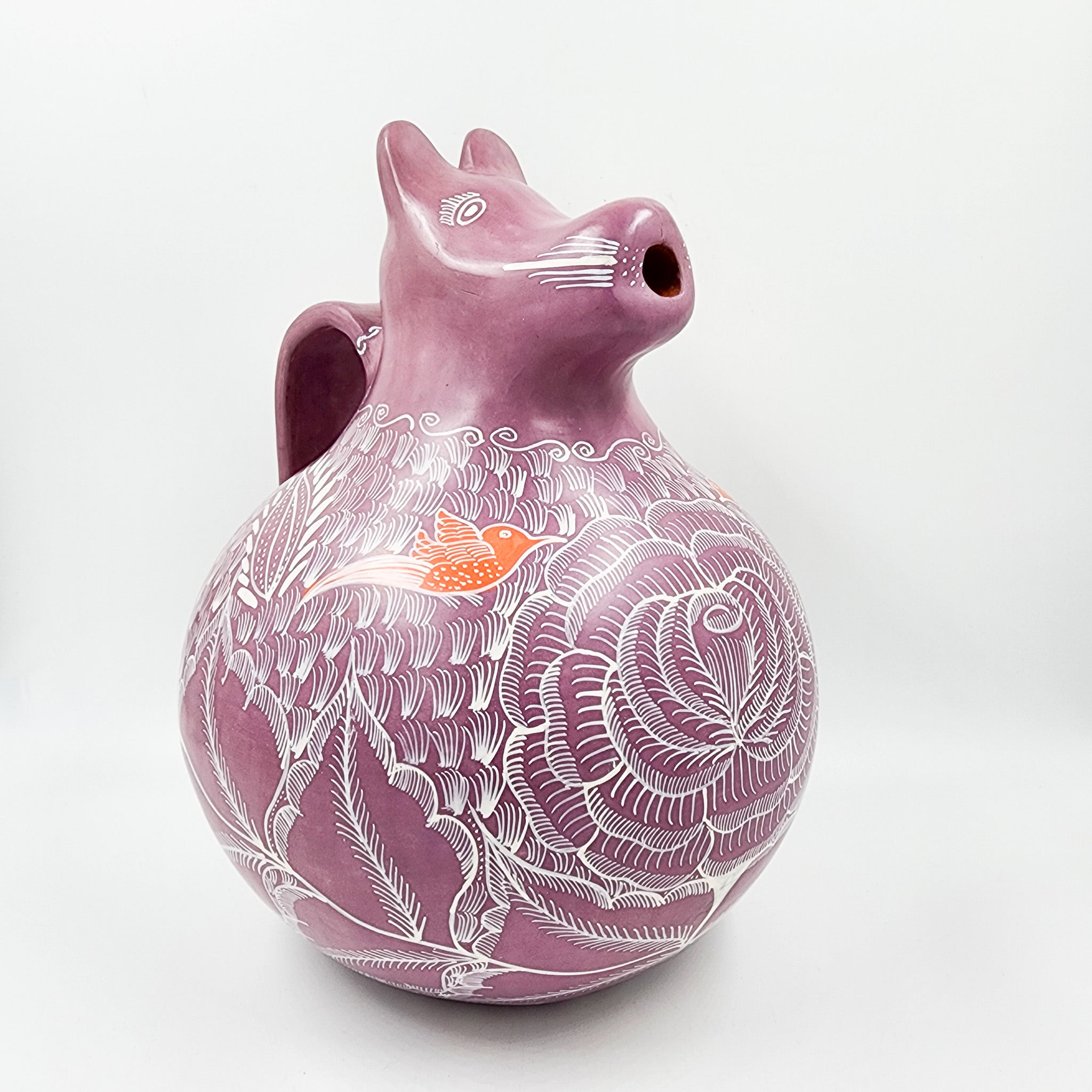 Jarra de perrito de barro bruñido