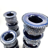 Juego de 3 candelabros de barro vidriado azul marino