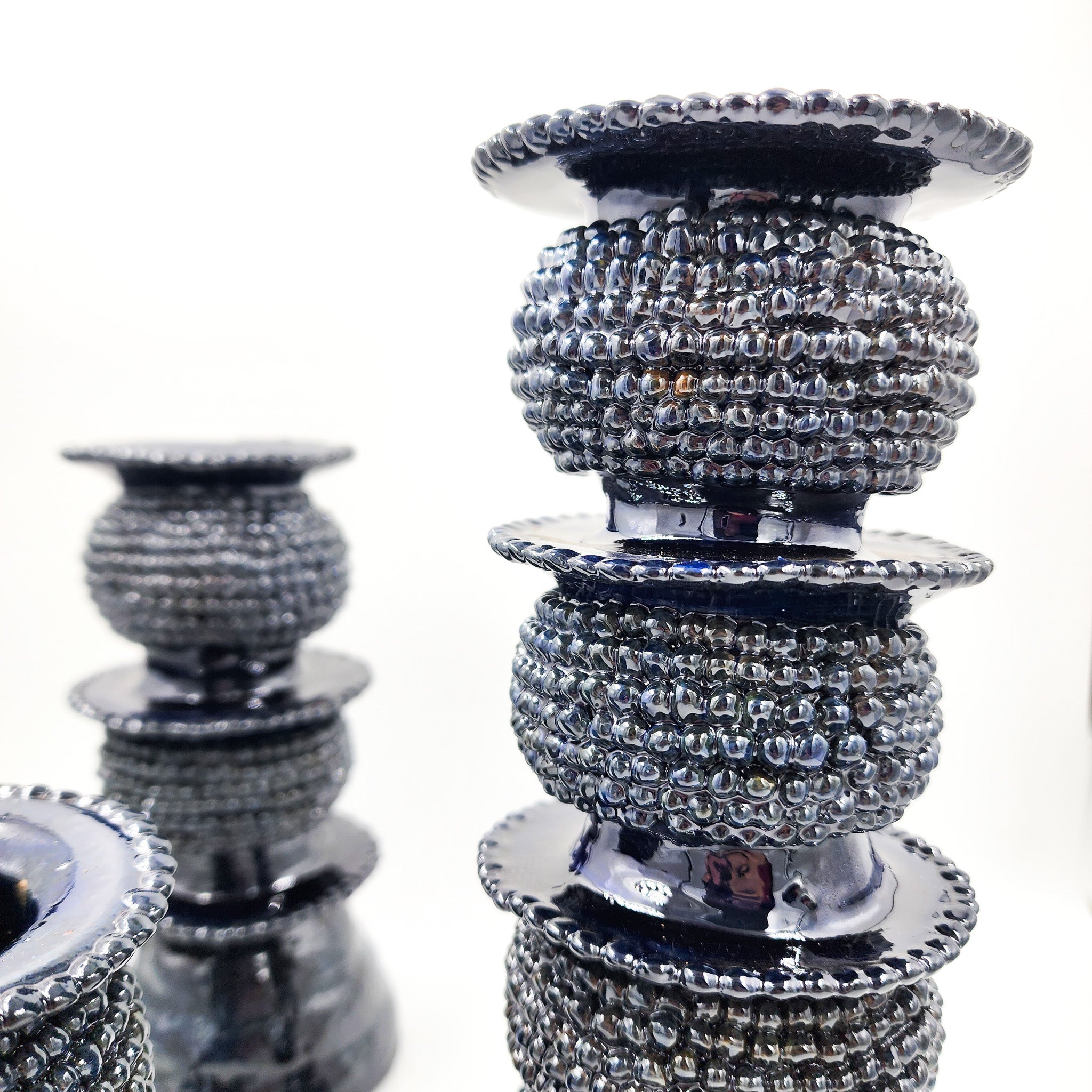 Juego de 3 candelabros de barro vidriado azul marino