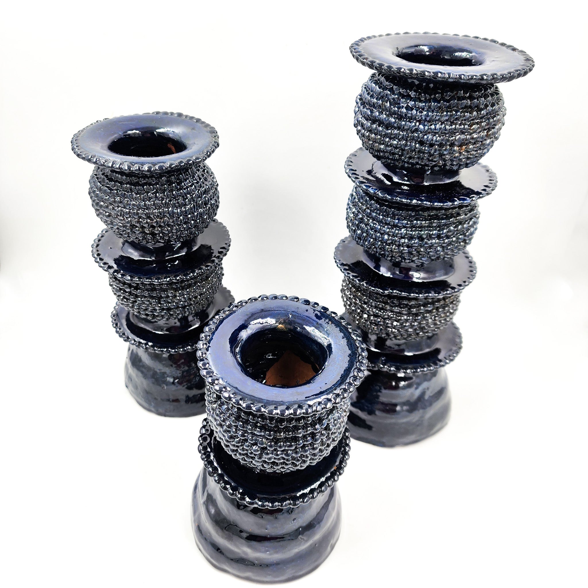 Juego de 3 candelabros de barro vidriado azul marino