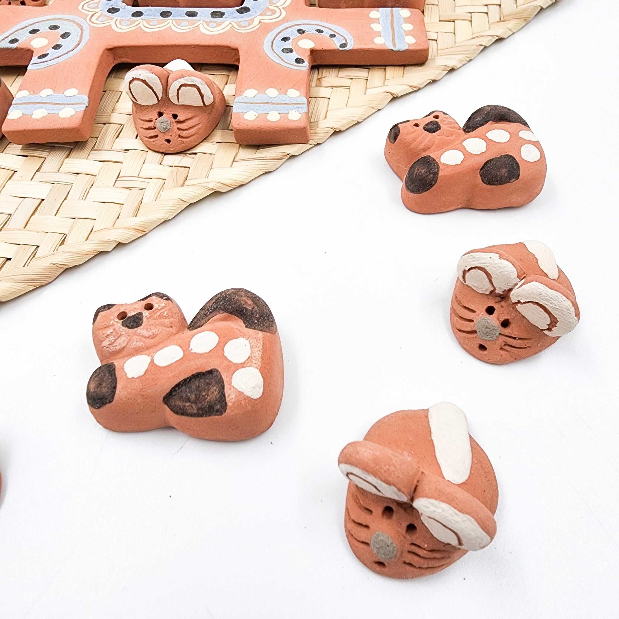 Juego de gato de barro