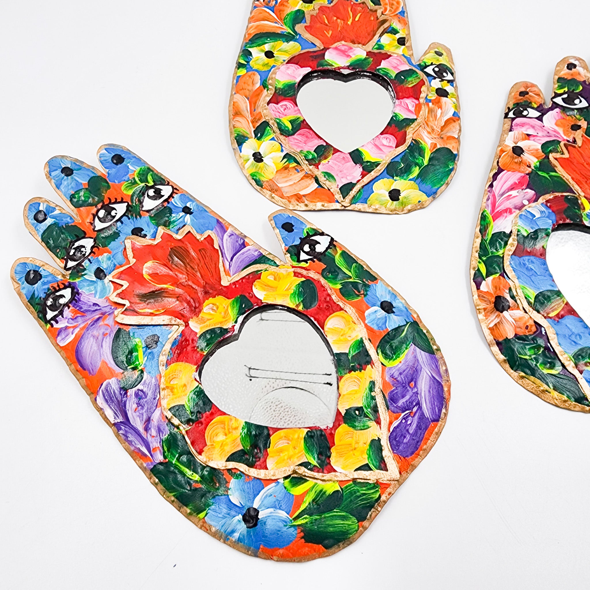 Miracle Hand with tin heart and mirror