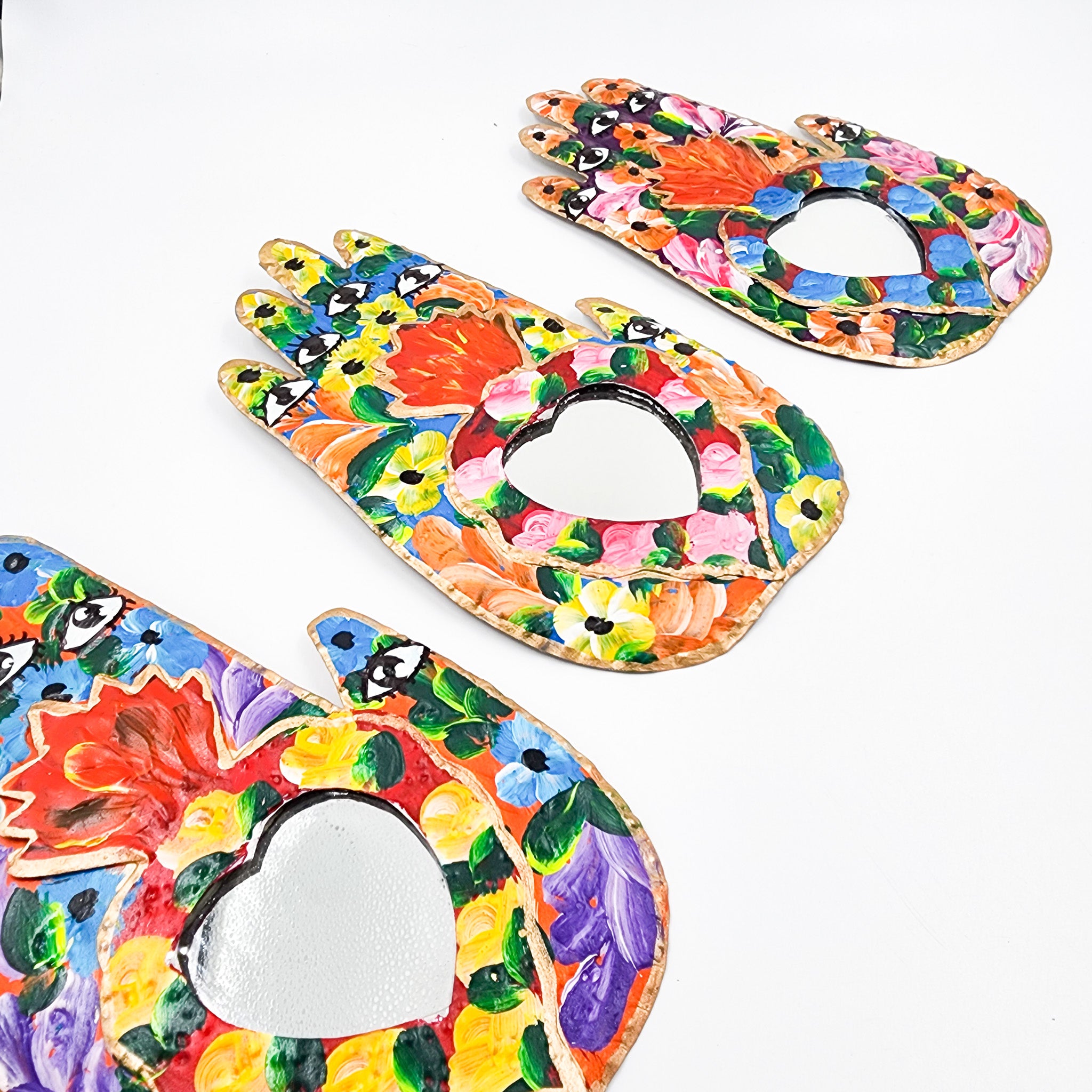 Miracle Hand with tin heart and mirror