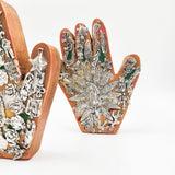 Mano de milagritos con Virgen de Guadalupe