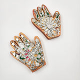 Mano de milagritos con Virgen de Guadalupe