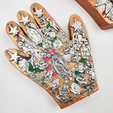 Mano de milagritos con Virgen de Guadalupe