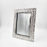 Marco para fotos de hojalata repujada