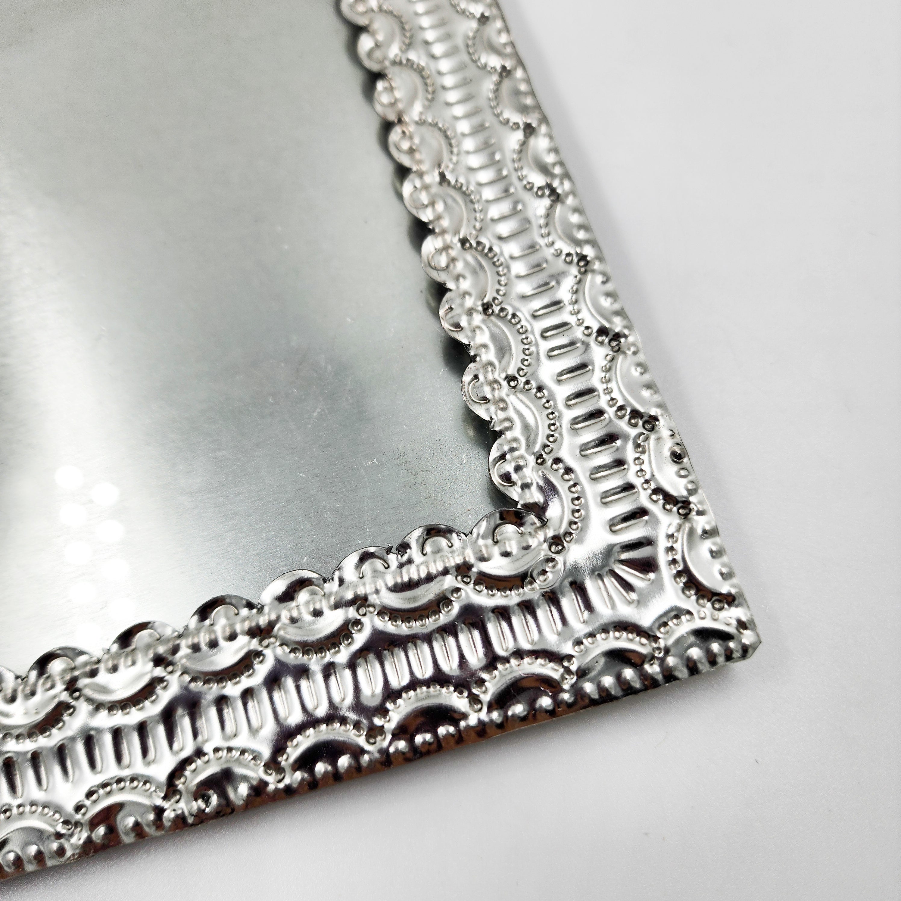 Marco para fotos de hojalata repujada