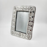 Marco para fotos de hojalata repujada