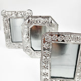 Marco para fotos de hojalata repujada