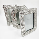 Marco para fotos de hojalata repujada