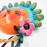 Máscara muñequita hecha de coco