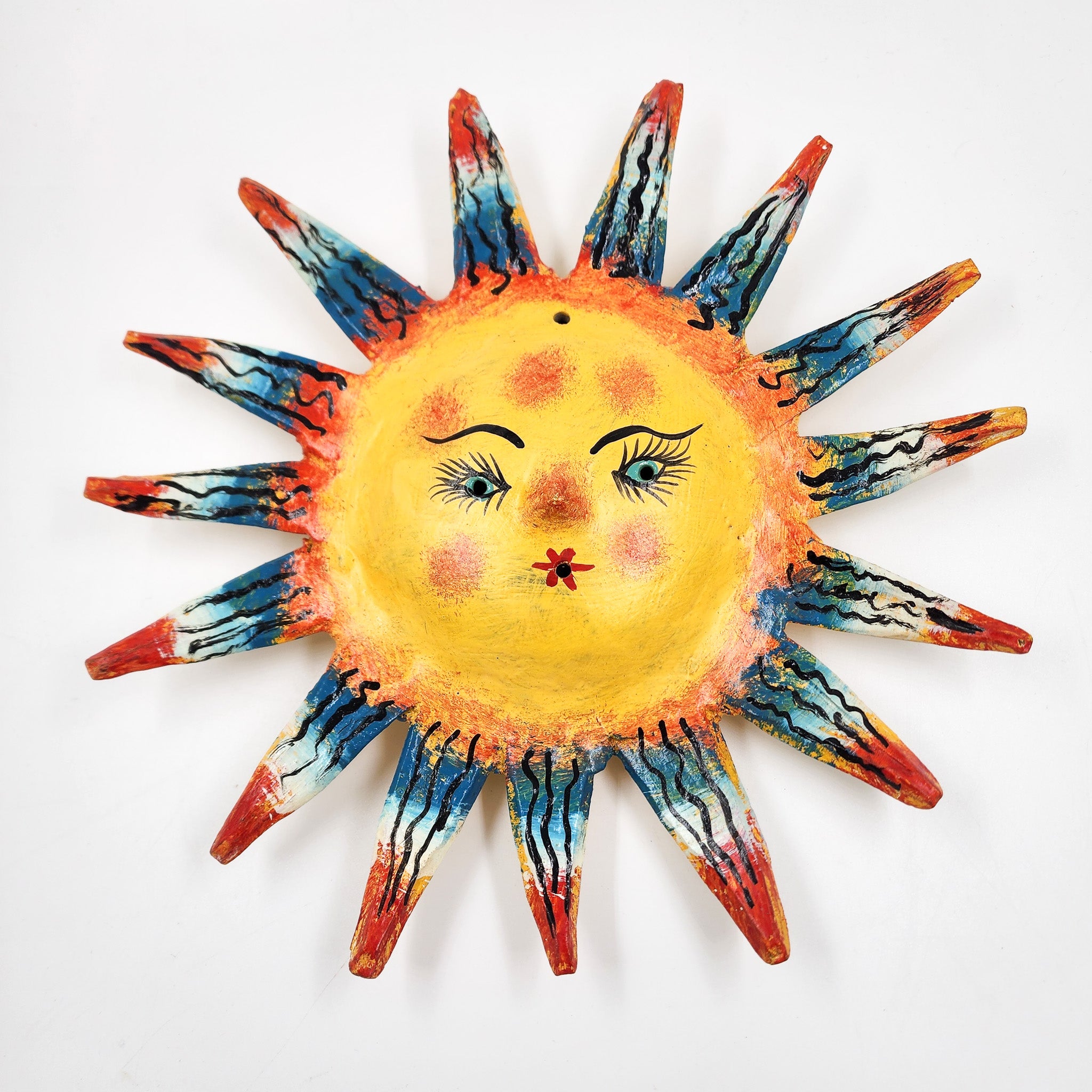 Máscara Sol hecha de coco