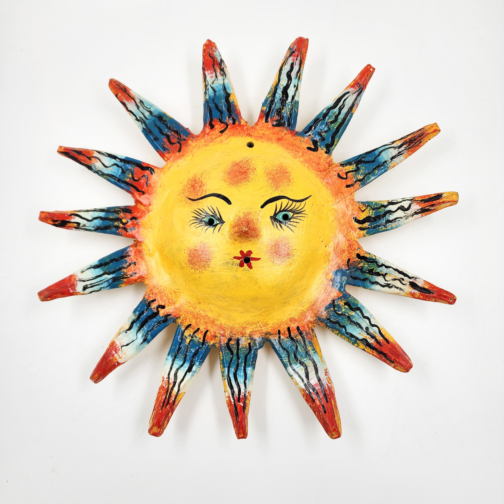 Máscara Sol hecha de coco