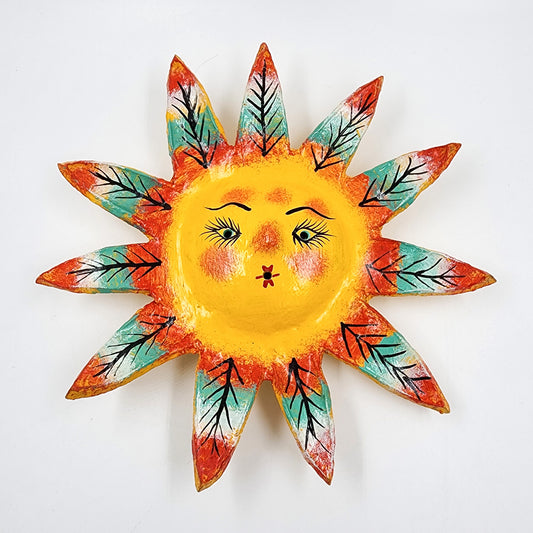 Máscara Sol hecha de coco