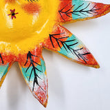 Máscara Sol hecha de coco